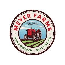 The logo of meyer farms - sun powered - soil grown
